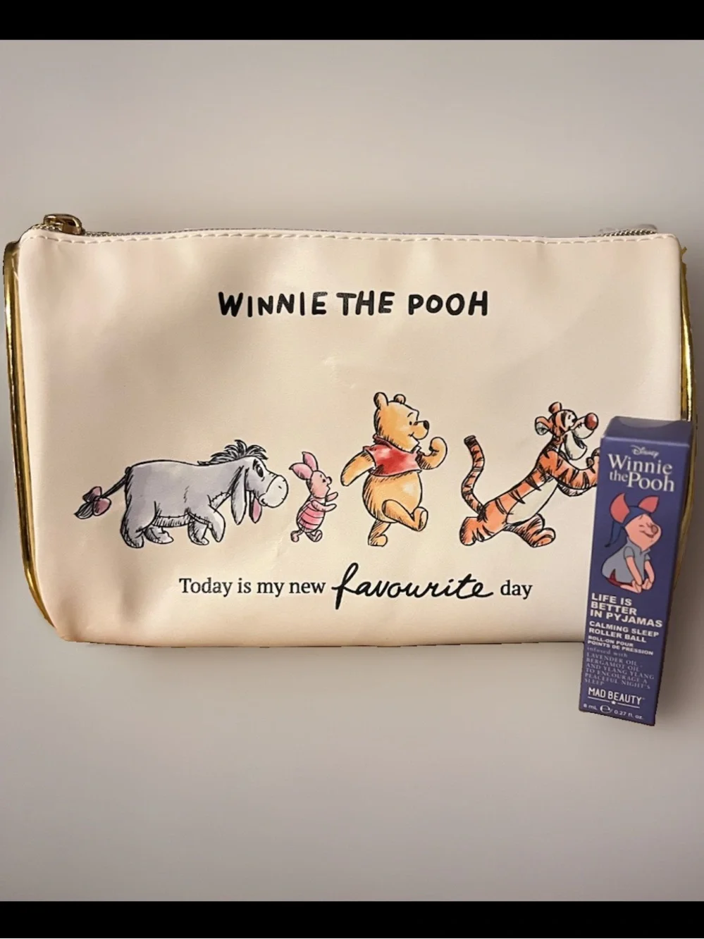 Winnie the Pooh Bundle Cream Cosmetic Bag and Calming Sleep Roller by Mad Beauty